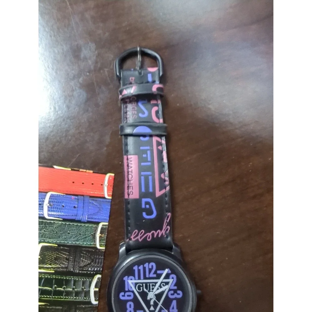 Rare vintage 90s Guess watch with original case and paperwork.